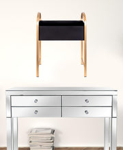 Macetero de metal dorado y negro