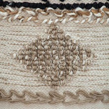 Otomana abstracta redonda de yute beige y madera marrón de 16