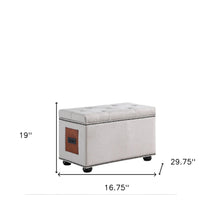 Otomana capitoné negra y 100 % lino caqui claro de 17