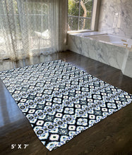 5' X 7' Black And Blue Oriental Area Rug