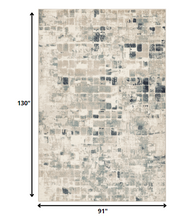 8’ x 11’ Beige Blue Abstract Tiles Distressed Area Rug