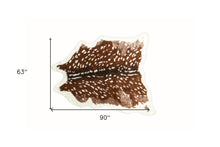 5' X 8' Off White And Brown Faux Cowhide Tufted Washable Non Skid Area Rug