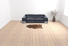 5' X 8' Off White And Brown Faux Cowhide Tufted Washable Non Skid Area Rug