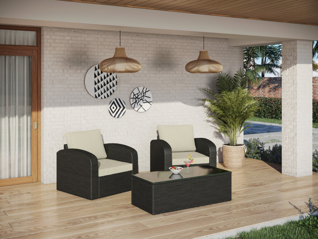 Three Piece Black RA Faux Rattan and Ivory Outdoor Seating Set with Table
