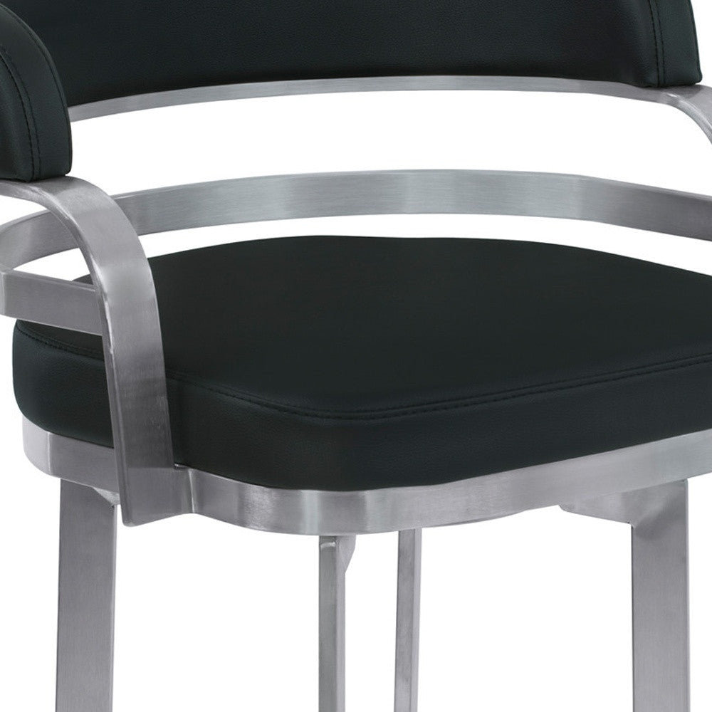 38" Black And Silver Faux Leather And Iron Swivel Low Back Bar Height Chair With Footrest