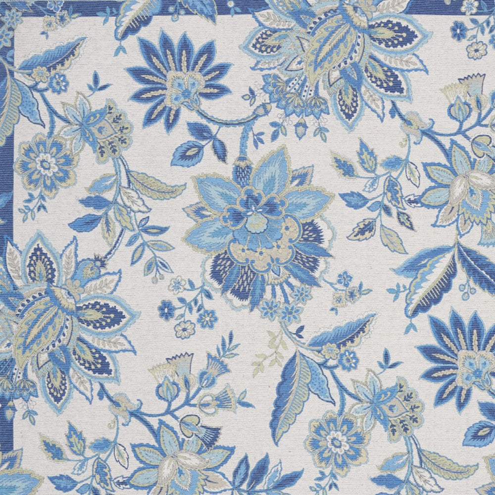 8' X 10' Ivory And Blue Floral Distressed Washable Area Rug