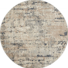 5' X 5' Beige And Grey Round Abstract Power Loom Non Skid Area Rug