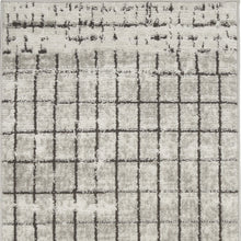 2' X 4' Ivory And Grey Abstract Power Loom Distressed Non Skid Area Rug