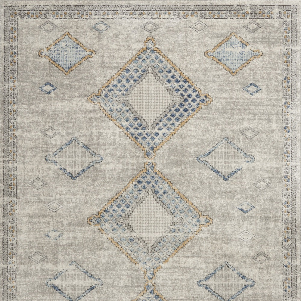 5' X 7' Ivory Grey And Blue Southwestern Power Loom Non Skid Area Rug