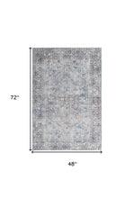 Light Grey And Blue Oriental Power Loom Distressed Washable Area Rug - 4' X 6'