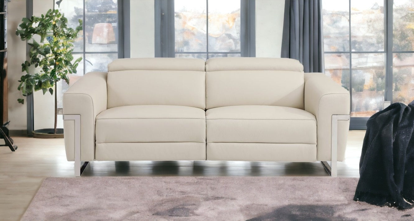 83" Beige Italian Leather and Chrome Reclining Sofa