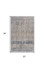 2' X 3' Cream Blue And Ivory Geometric Distressed Stain Resistant Area Rug