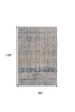 8' X 11' Cream Blue And Ivory Geometric Distressed Stain Resistant Area Rug