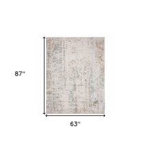 Gray Blue Taupe And Cream Abstract Distressed Stain Resistant Area Rug - 5' x 7'