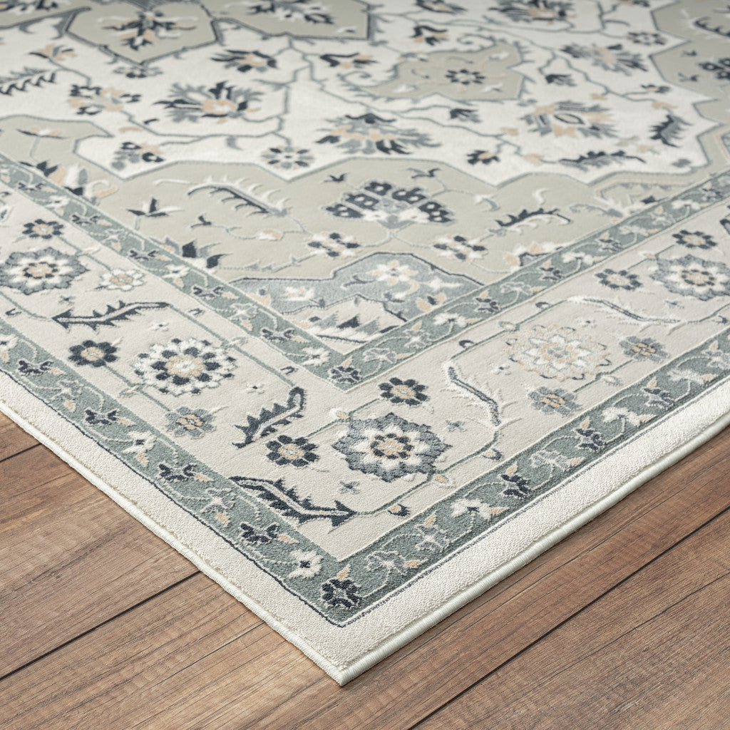 8' X 11' Gray Cream And Ivory Floral Stain Resistant Area Rug