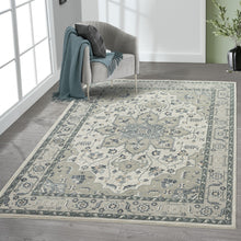 8' X 11' Gray Cream And Ivory Floral Stain Resistant Area Rug