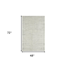 4' X 6' Ivory And Gray Floral Stain Resistant Area Rug