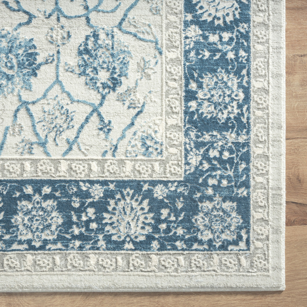 5' X 8' Blue Gray And Ivory Floral Power Loom Stain Resistant Area Rug