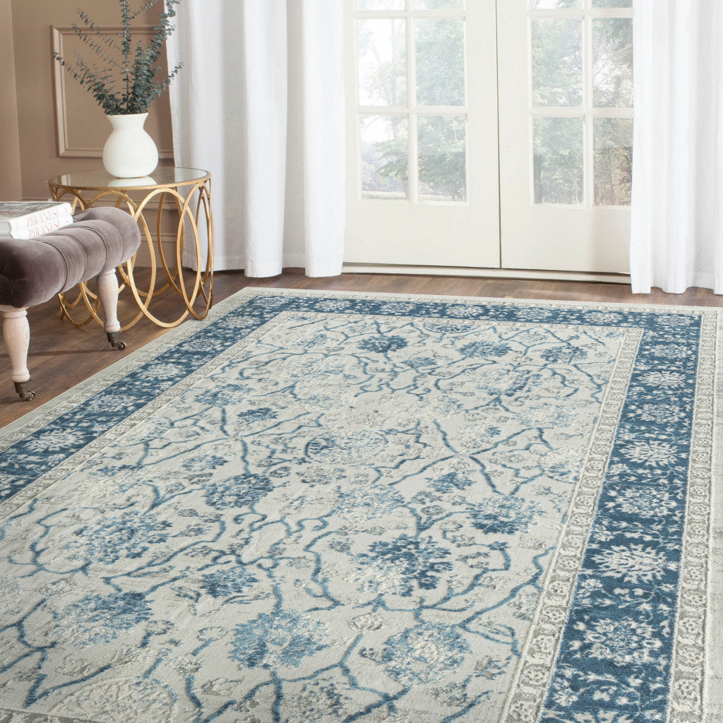 8' X 10' Blue Gray And Ivory Floral Power Loom Stain Resistant Area Rug