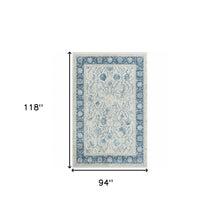8' X 10' Blue Gray And Ivory Floral Power Loom Stain Resistant Area Rug