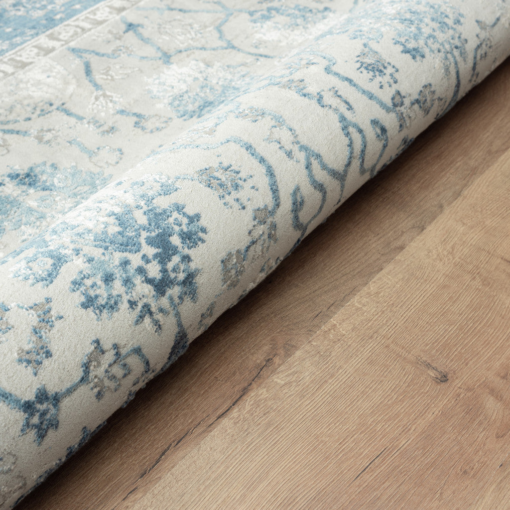 9' X 12' Blue Gray And Ivory Floral Power Loom Stain Resistant Area Rug