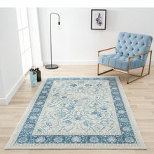 9' X 12' Blue Gray And Ivory Floral Power Loom Stain Resistant Area Rug