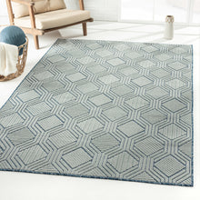 5' X 7' Light Blue And Navy Geometric Stain Resistant Area Rug