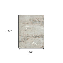 7' X 9' Beige Gray And Brown Abstract Area Rug