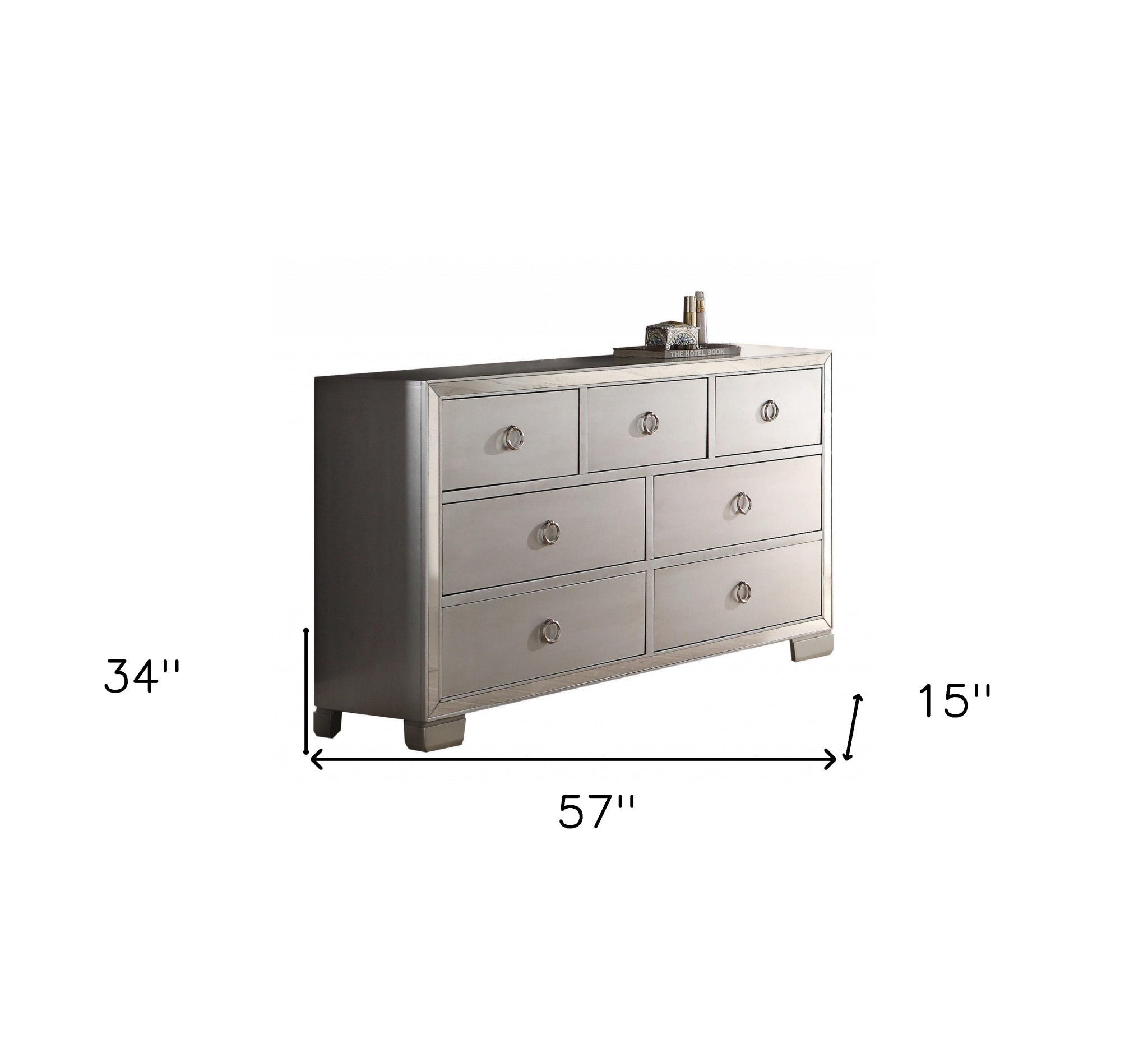 57" Platinum Manufactured Wood Seven Drawer Triple Dresser