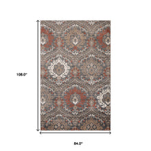 7' X 9' Rust Floral Stain Resistant Area Rug