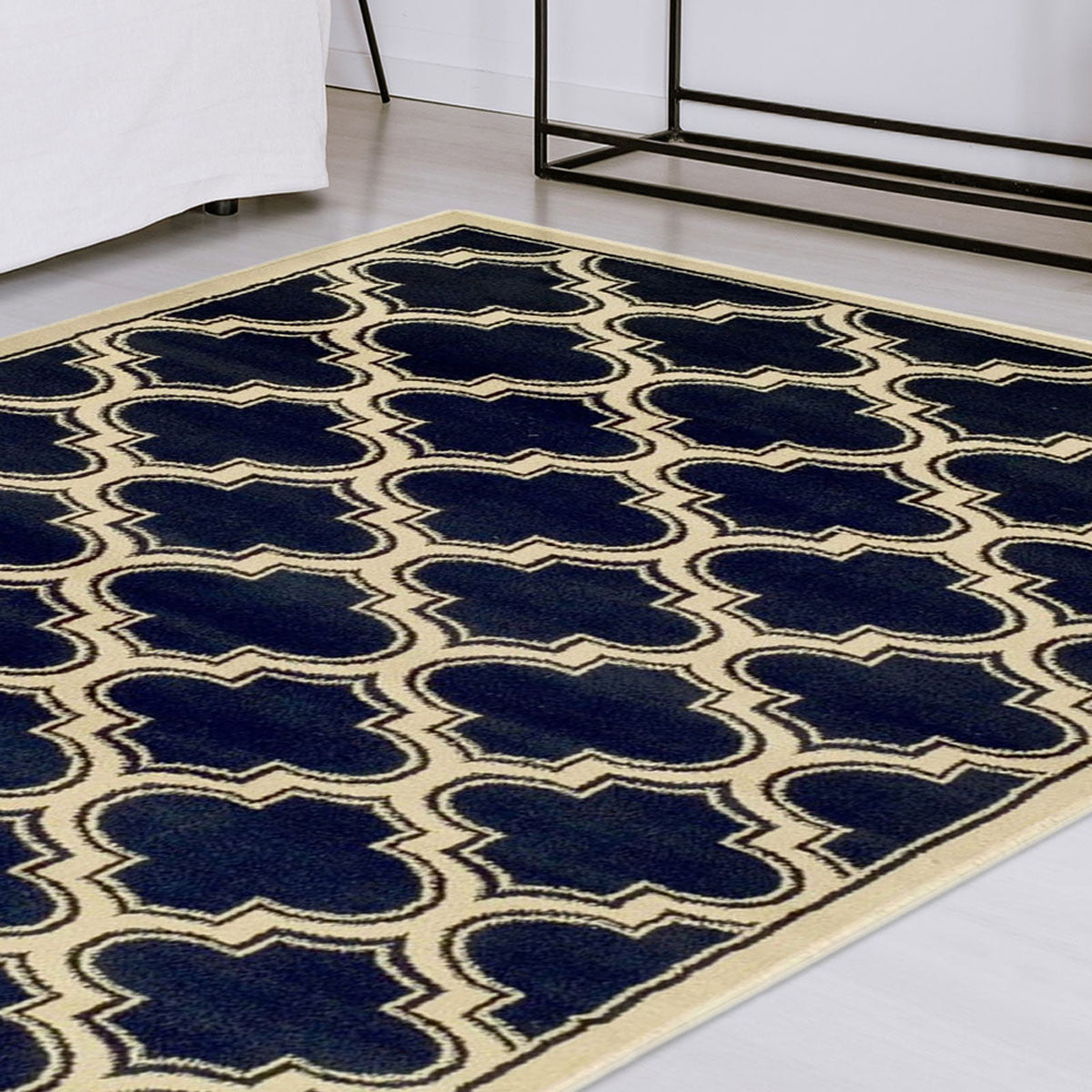 5' X 8' Dark Blue And Cream Geometric Stain Resistant Area Rug