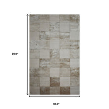 5' X 8' Beige Geometric Hand Woven Stain Resistant Area Rug