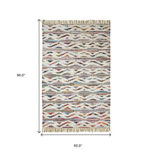 5' X 8' White And Southwest Palette Geometric Hand Woven Area Rug