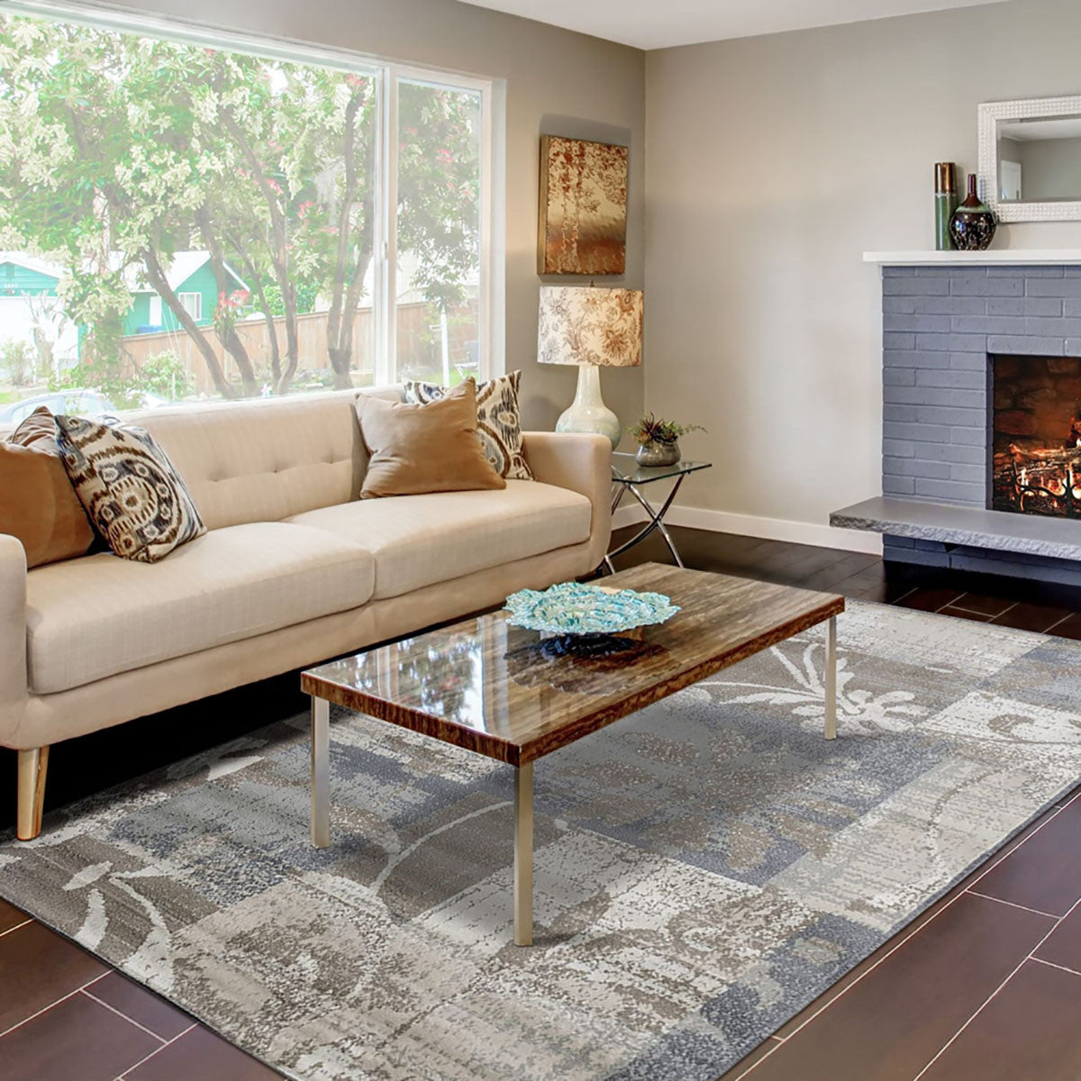 5' X 8' Brown And Ivory Floral Power Loom Distressed Stain Resistant Area Rug