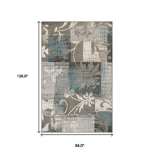 8' X 10' Teal Gray And Tan Floral Power Loom Distressed Stain Resistant Area Rug