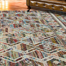 8' X 10' Ivory Blue Pink Gold And Green Geometric Hand Woven Area Rug With Fringe