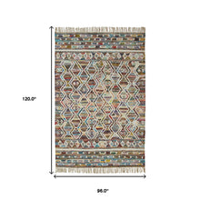 8' X 10' Ivory Blue Pink Gold And Green Geometric Hand Woven Area Rug With Fringe