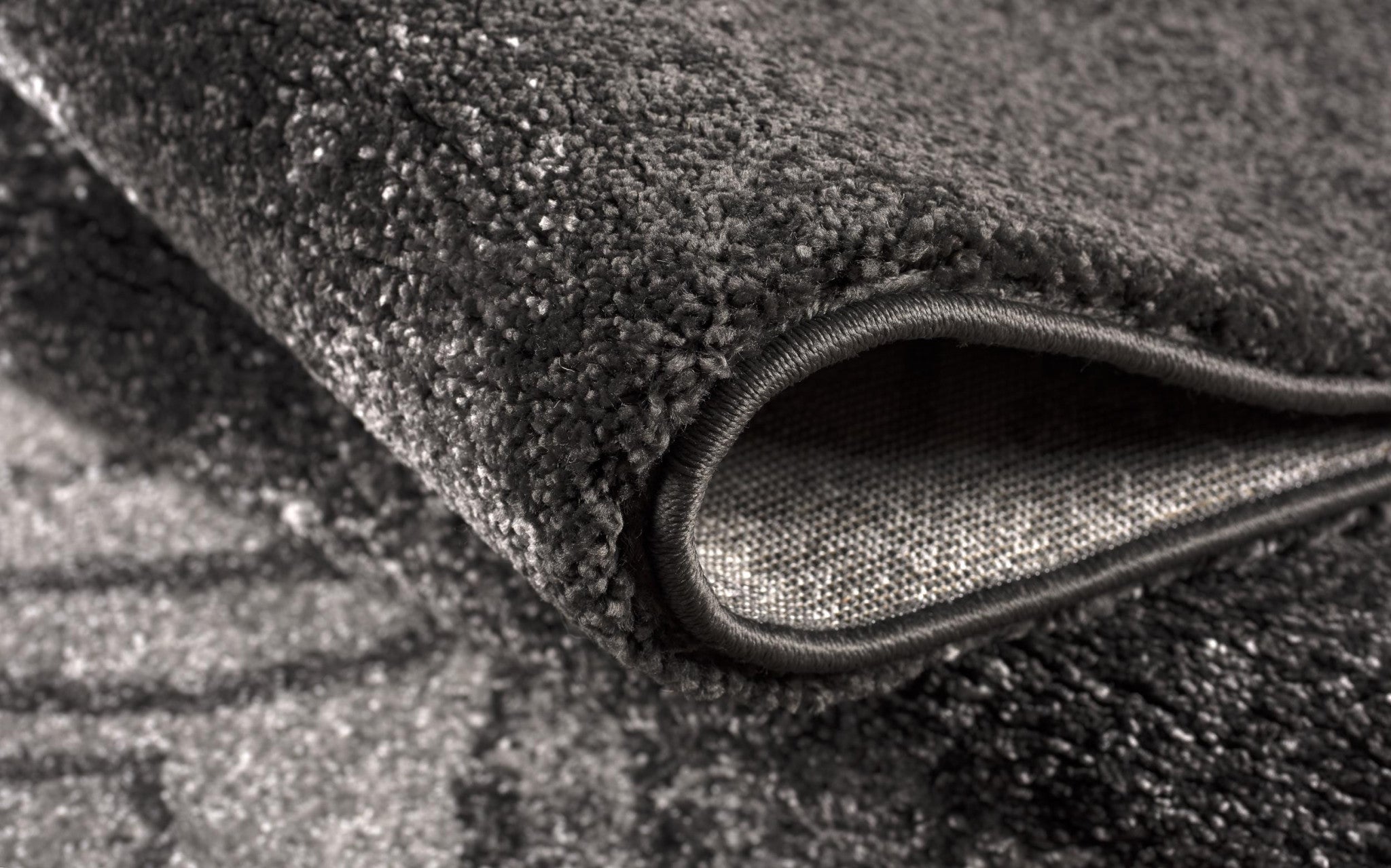 4' X 6' Black Abstract Power Loom Stain Resistant Area Rug