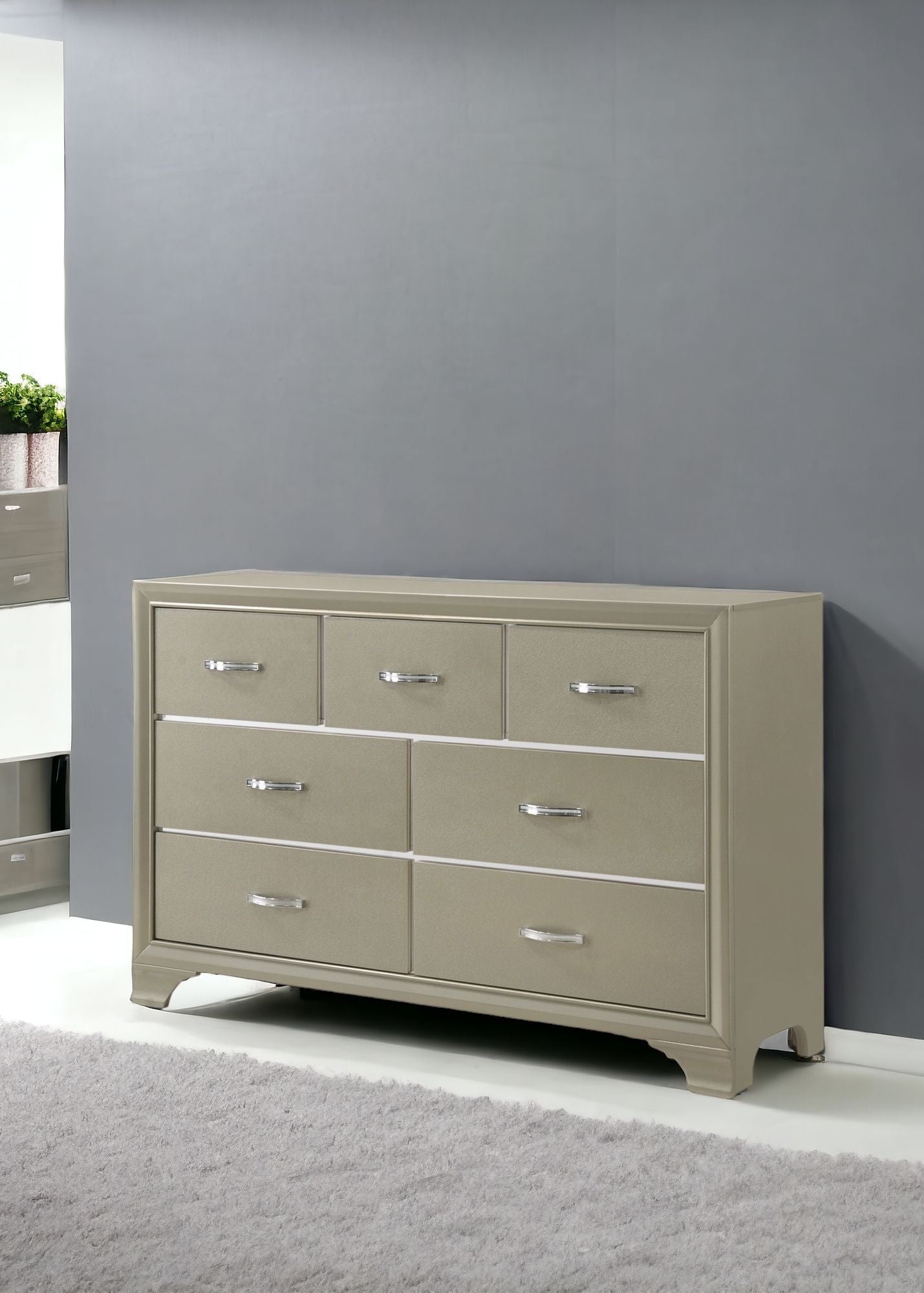58" Champagne Manufactured Wood Seven Drawer Triple Dresser
