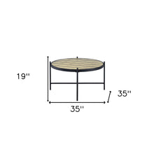 Mesa de centro redonda de madera manufacturada y vidrio negro y dorado de 35