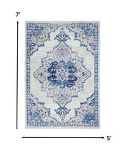 Ivory and Blue Medallion Area Rug - 5’ x 7’