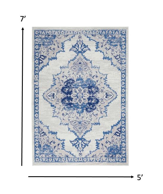 Ivory and Blue Medallion Area Rug - 5’ x 7’