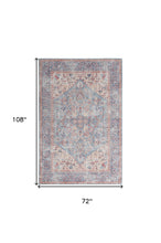 6' X 9' Blue And Orange Medallion Distressed Washable Area Rug