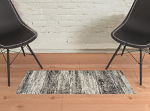 2' X 3' Charcoal Grey Silver And Ivory Abstract Power Loom Stain Resistant Area Rug