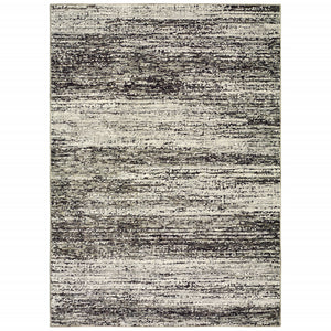 2' X 3' Charcoal Grey Silver And Ivory Abstract Power Loom Stain Resistant Area Rug