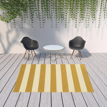 6' X 9' Gold Geometric Stain Resistant Indoor Outdoor Area Rug
