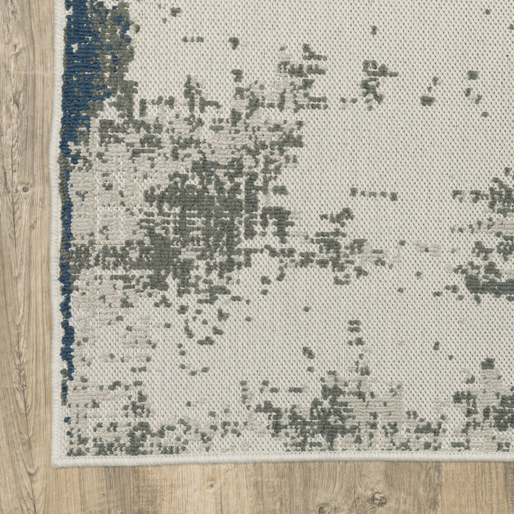2' X 7' Beige Abstract Stain Resistant Indoor Outdoor Area Rug