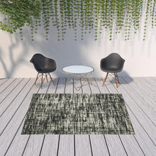6' X 9' Black Abstract Stain Resistant Indoor Outdoor Area Rug