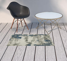 2' X 3' Beige Abstract Stain Resistant Indoor Outdoor Area Rug