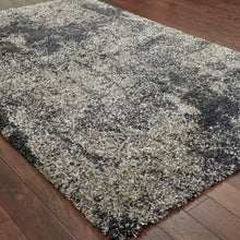 4' X 6' Charcoal Silver And Grey Abstract Shag Power Loom Stain Resistant Area Rug